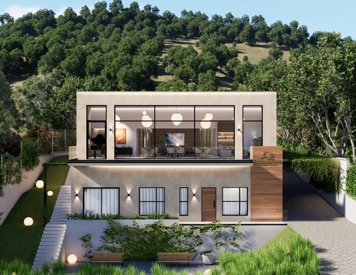 Fachada de Residencia Vista de Oro rodeada de vegetación, con el salón social iluminado en el segundo piso
